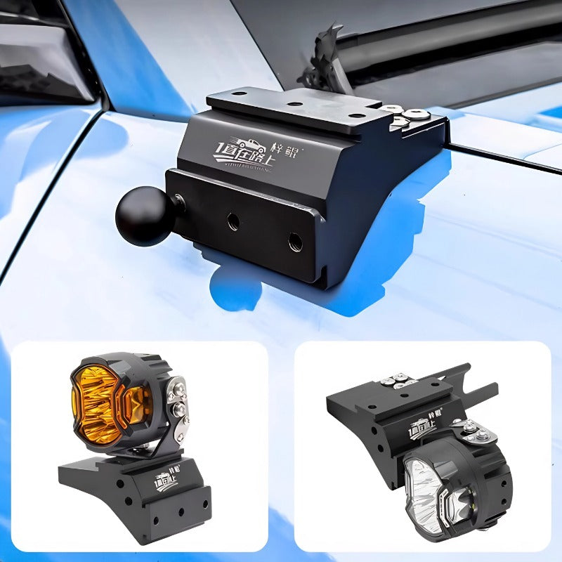 Black heavy-duty metal bumper mount with ball hitch and adjustable LED auxiliary lights.