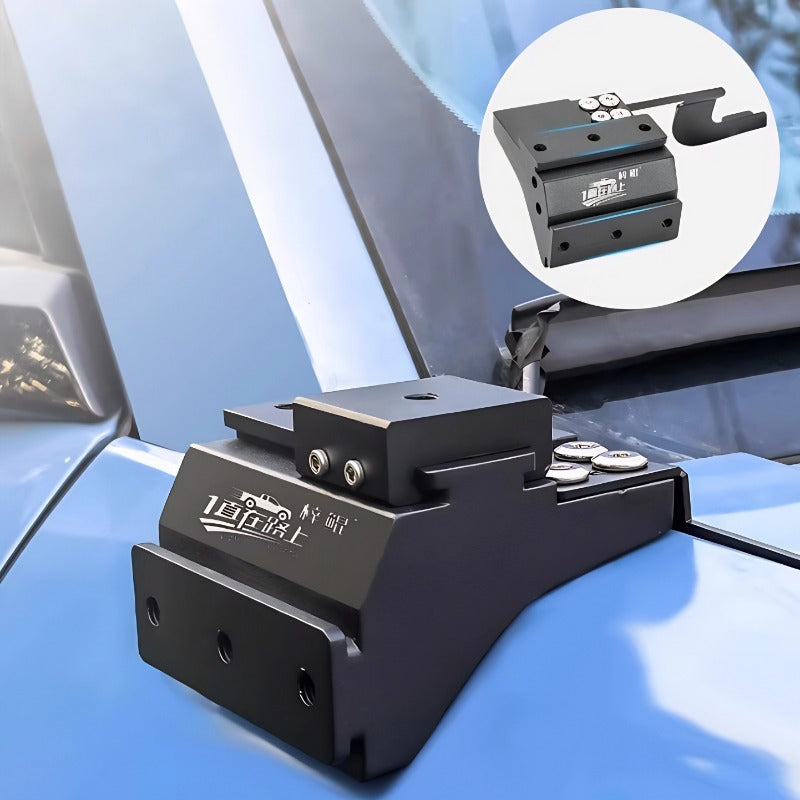 Black heavy-duty metal roof rack mounting bracket installed on a blue car hood.