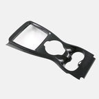 Black carbon fiber patterned interior trim panel for BYD vehicle console.