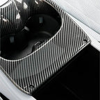 Carbon fiber pattern interior cup holder cover for BYD vehicles in black and grey.