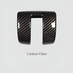 Black carbon fiber patterned interior trim accessory with a glossy finish.