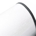 White perforated leather texture with a sleek black edge detail.
