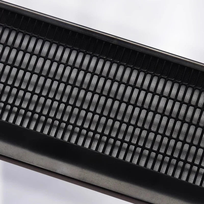 Black matte finish mesh grille with a durable protective metal texture.