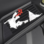 Black textured rubber car tray mat protecting the console from spills and debris.