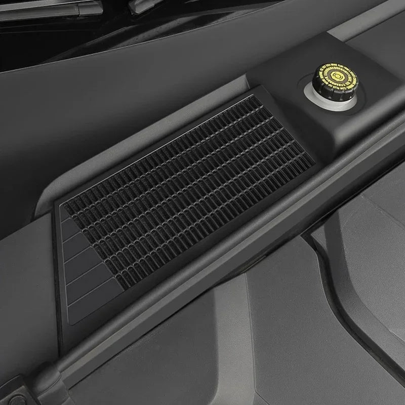 Black textured protective cowl vent cover for BYD vehicle engine compartment.