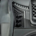 Black textured TPE car floor mat with anti-slip honeycomb pattern and raised edge protection.