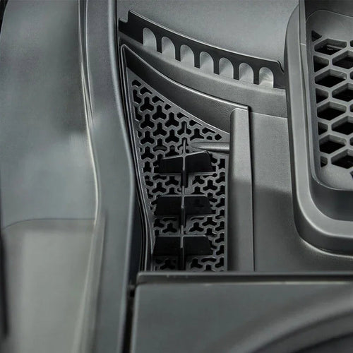 Black textured TPE car floor mat with anti-slip honeycomb pattern and raised edge protection.