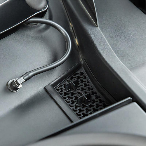Black textured interior trim panel with a flexible black cable connection for BYD accessories.