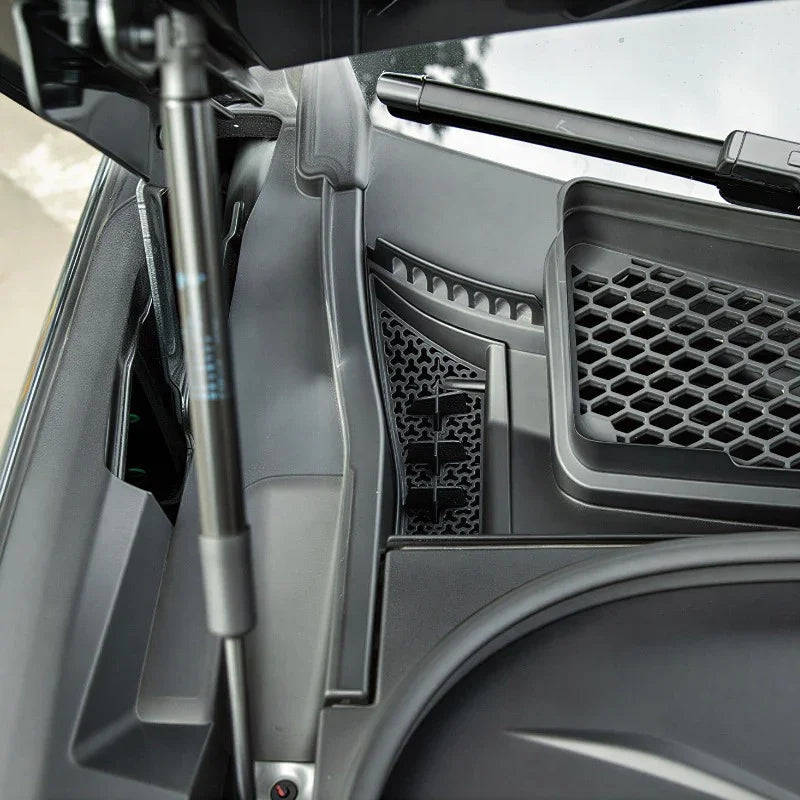 Black textured plastic trunk organizer tray with honeycomb pattern for BYD car storage.