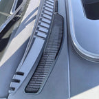 Close-up of a matte black durable plastic cowl cover vent for a BYD vehicle.