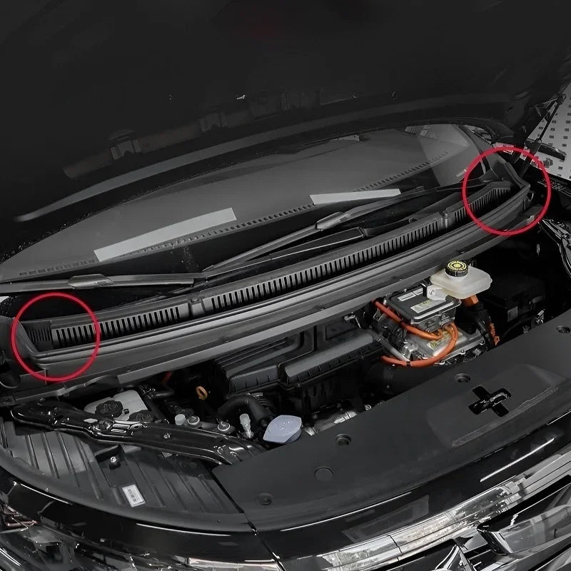 Black durable plastic cowl cover installed on a BYD vehicle engine bay.