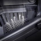 Close-up of black durable plastic car floor mat featuring a breathable grid design for ventilation.