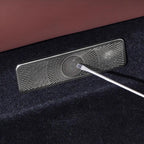 Elegant silver metallic textured floor trim plate with sunburst pattern for car interior.