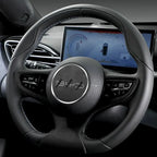 Black leather steering wheel with blue contrast stitching and integrated multimedia controls.