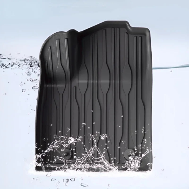Black waterproof TPE car floor mat with textured anti-slip surface and liquid resistance.