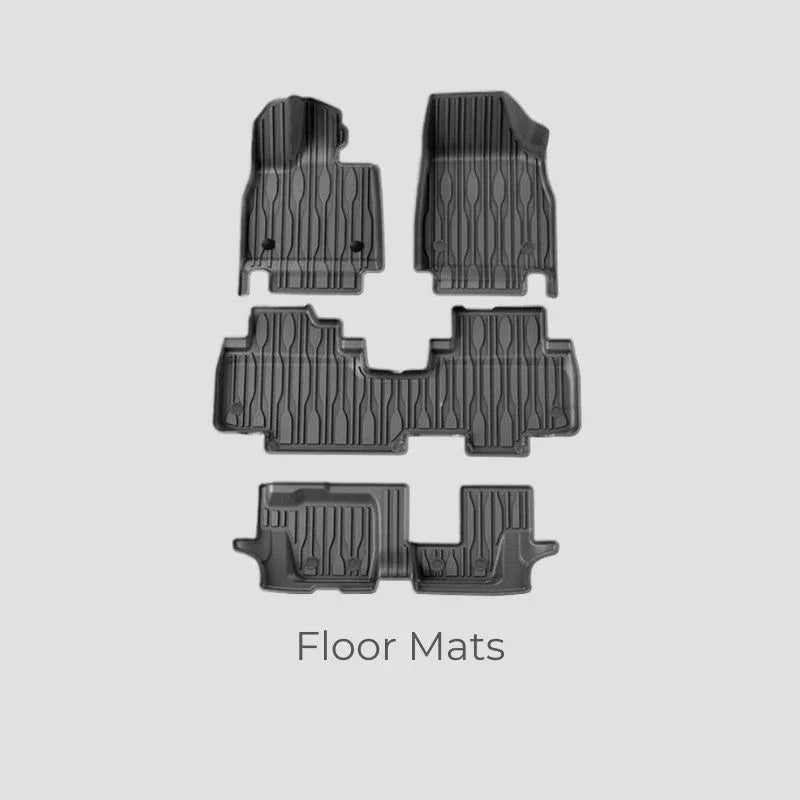 Custom-fit black TPE waterproof floor mats set for complete car interior protection.