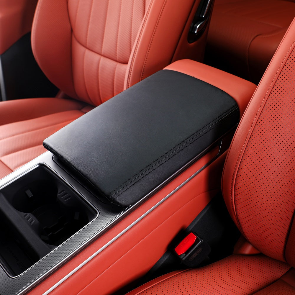 Black premium leather center console armrest cover for BYD interior protection.