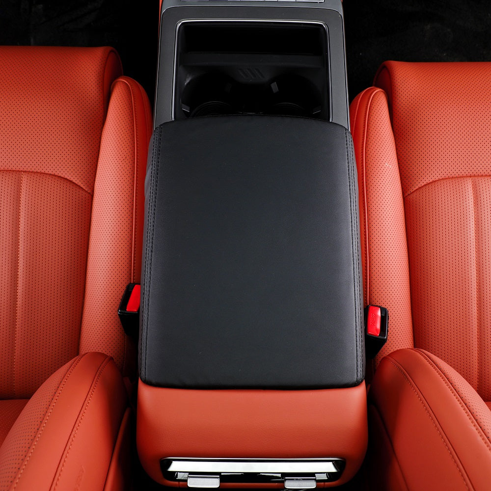 Premium black leather center console armrest cover for BYD, featuring a sleek matte finish.