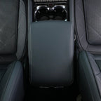 Premium dark grey leather center console armrest with white contrast stitching for BYD interior.