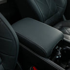 Premium dark grey leather center console armrest cover with white contrast stitching for BYD vehicles.