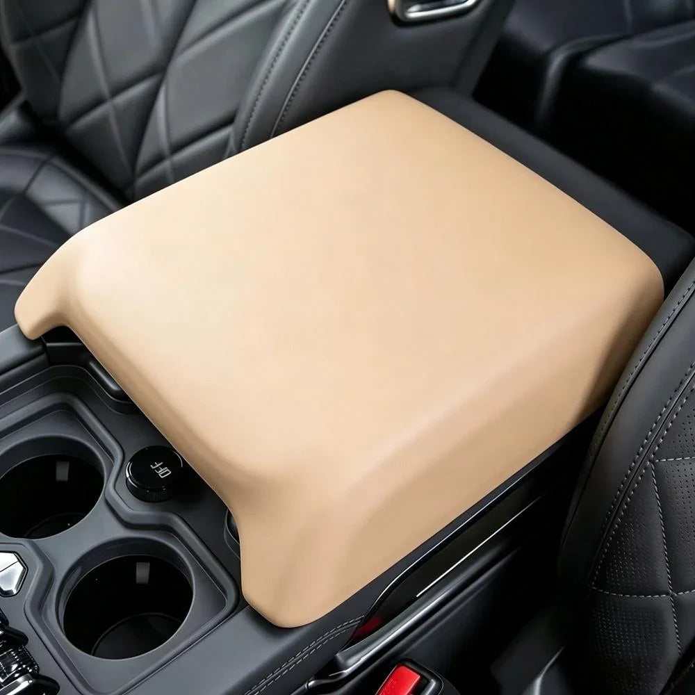 Tan premium faux leather center console armrest cover for BYD vehicle protection.
