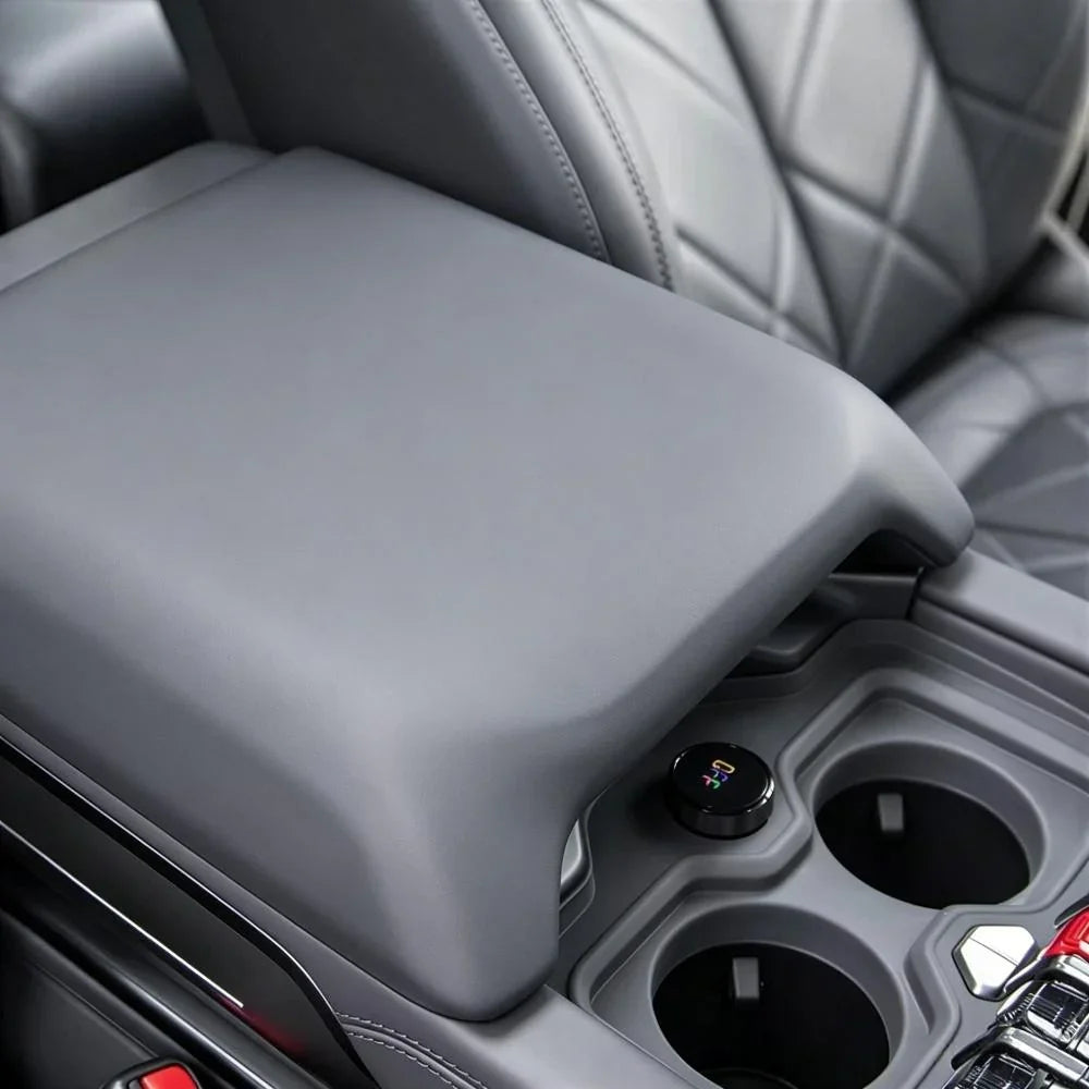 Premium grey leather center console armrest with quilted stitching for BYD interior protection.
