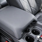 Premium grey leather center console armrest with quilted stitching for BYD interior protection.