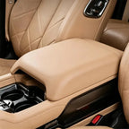 Premium tan leather center console armrest for BYD, featuring a smooth, ergonomic design.