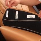 Black non-slip backing of a tan premium leather car seat cover accessory.