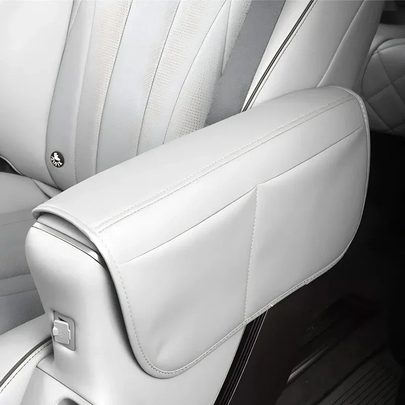 Premium light grey PU leather center console armrest cover with quilted stitching design.