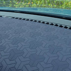 Grey leather dashboard cover for BYD featuring a unique geometric stitched pattern.
