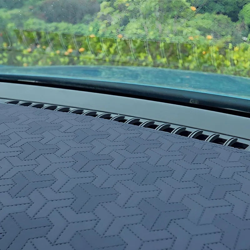 Grey textured faux leather dashboard cover for BYD, featuring a unique geometric pattern.