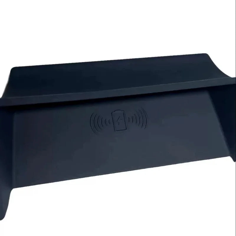 Black matte wireless charging pad cover for BYD interior protection.
