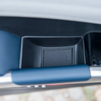 Black textured protective tray insert for BYD vehicle interior compartments.