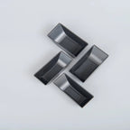Four black textured TPE car floor mats for BYD, featuring a durable anti-slip design.