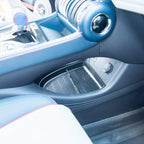 Black textured protective door pocket trim for BYD interior with premium blue leather accents.