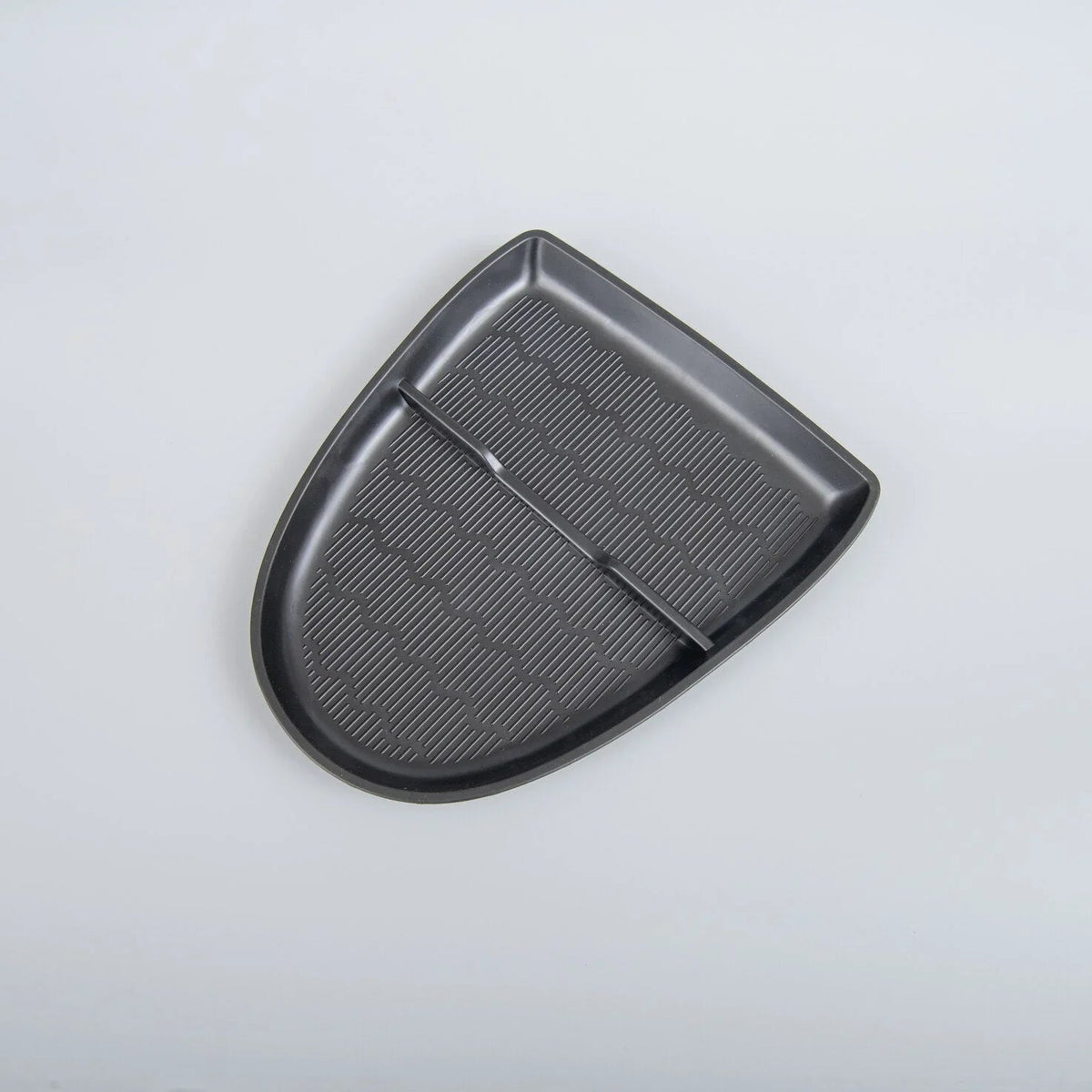 Black textured TPE car tray for BYD, featuring a durable non-slip pattern and custom fit.