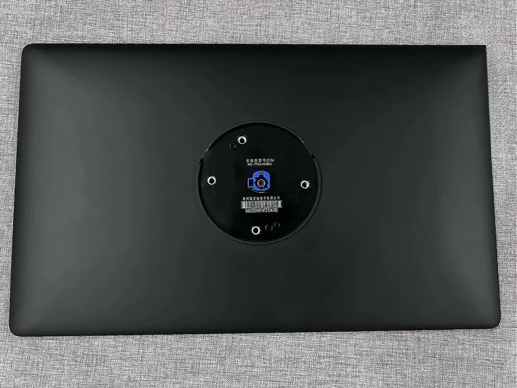 Black matte finish rear-view car camera housing with central mounting plate and screw holes.