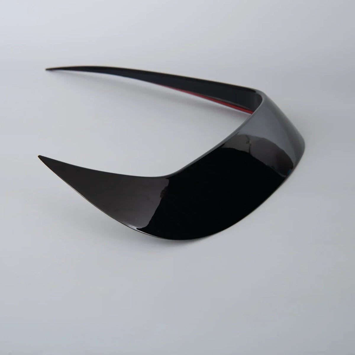 Glossy black automotive spoiler made of durable ABS plastic with a sleek aerodynamic design.