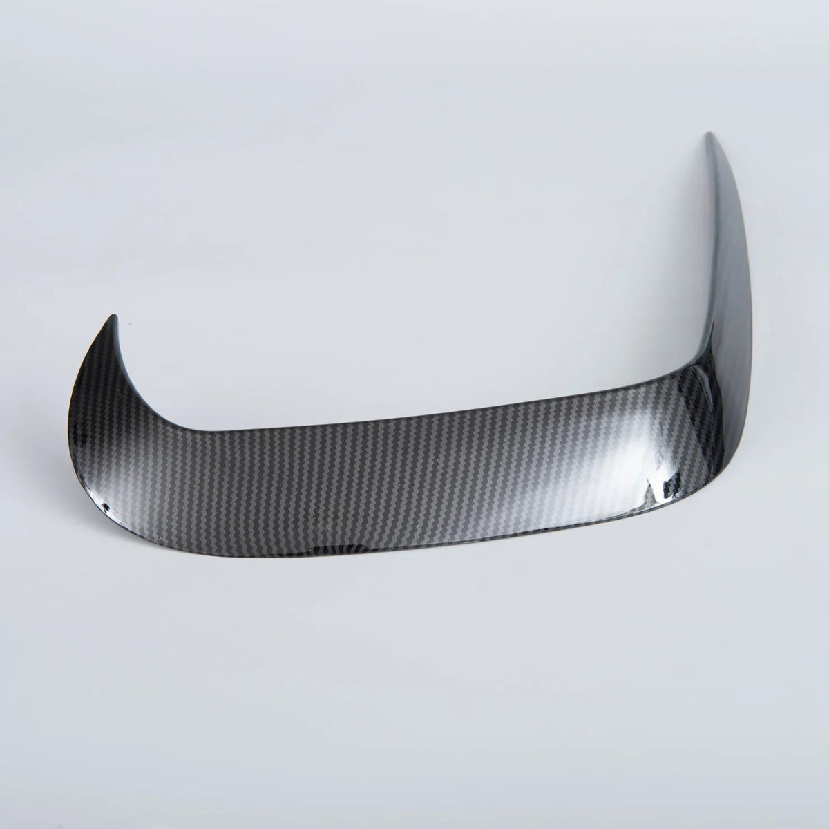 Professional carbon fiber front lip spoiler with a glossy grey textured finish