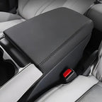Black premium leather car center console armrest with precision stitching for BYD interior.