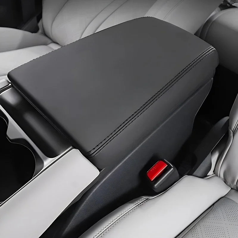 Black premium leather car center console armrest with precision stitching for BYD interior.