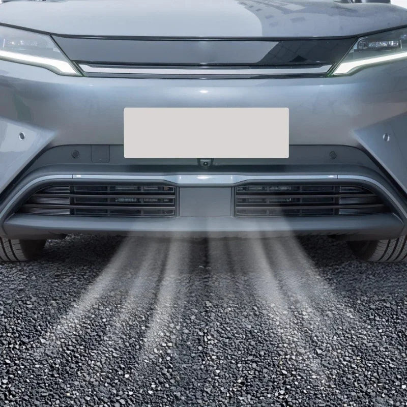 Front view of a grey car bumper featuring a black protective lower grille guard.