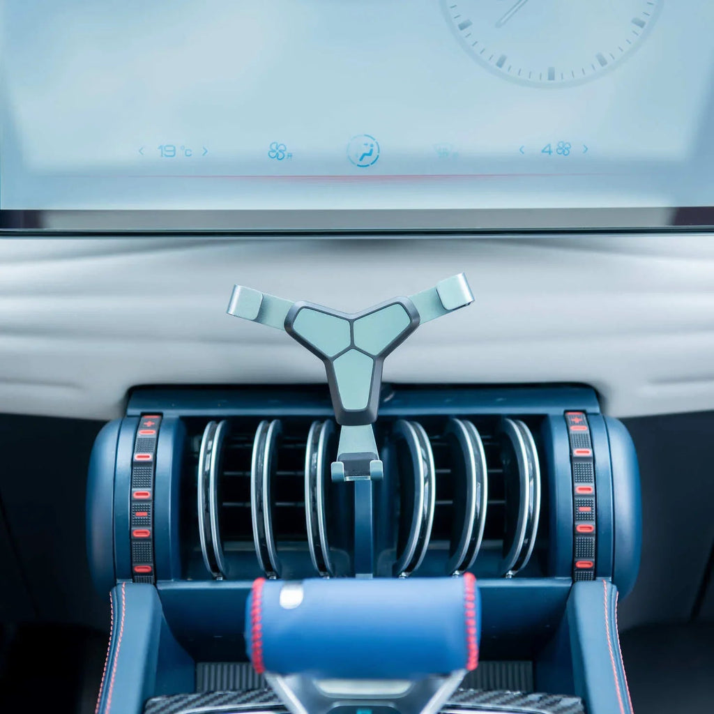 Sleek metallic grey Y-shaped gear shifter lever integrated into a blue BYD car interior.