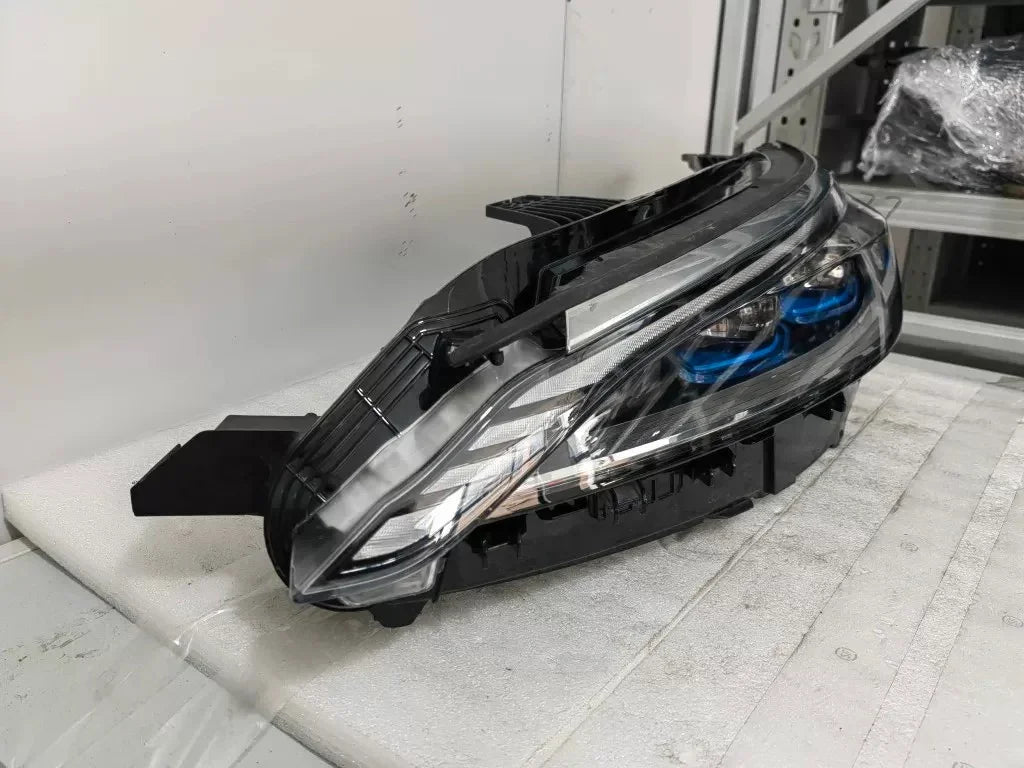 Sleek black and clear automotive LED headlight assembly for BYD vehicles.