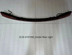 Curved red center rear light assembly for BYD with integrated wiring harness.