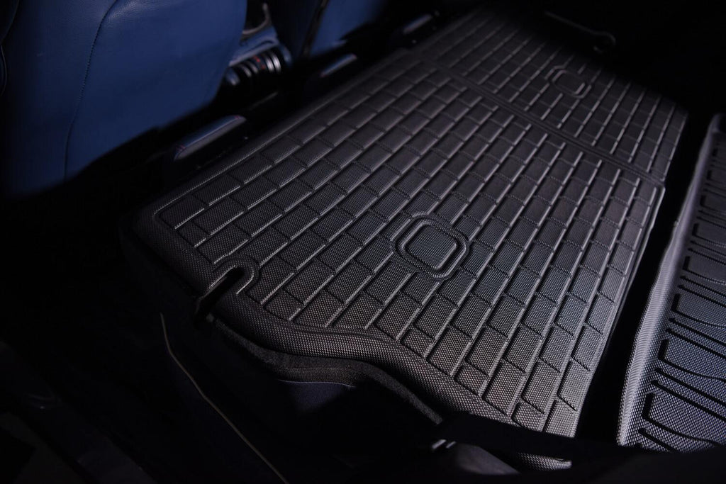 Durable black textured rubber cargo mat for car trunk protection