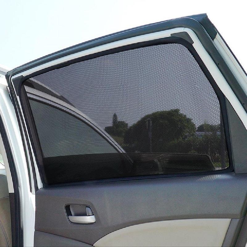 Black mesh car window sunshade installed on a vehicle door for UV protection.
