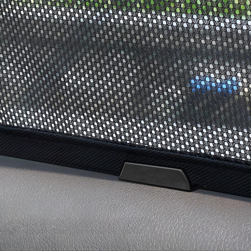 Close-up of a black mesh car sunshade with a durable fabric texture and trim.