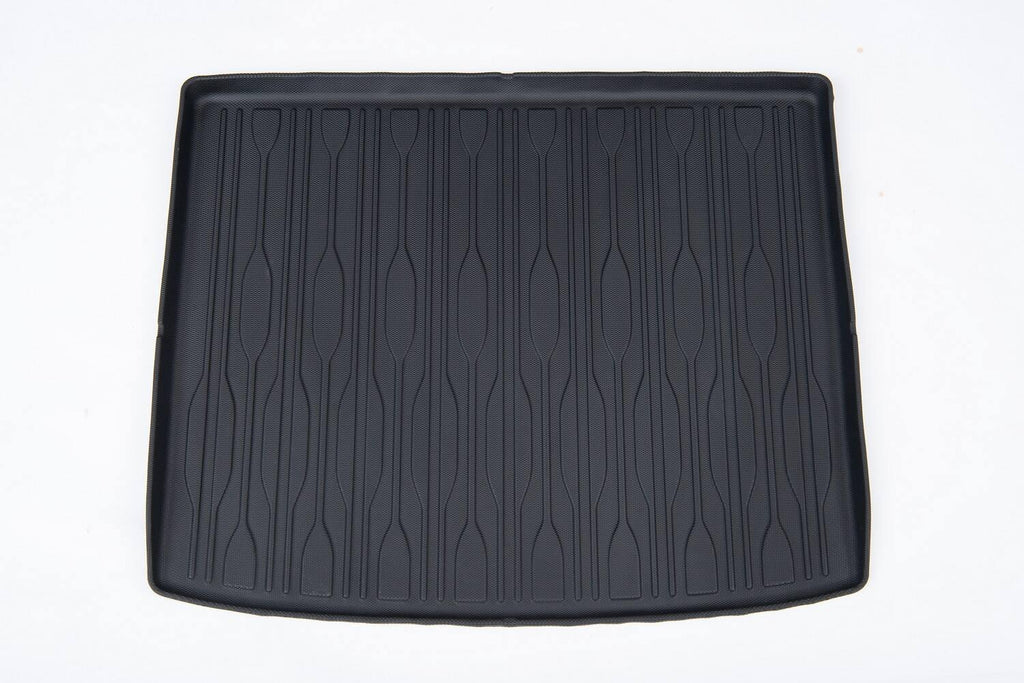 Black textured TPE trunk mat with anti-slip vertical grooves for durable car cargo protection.